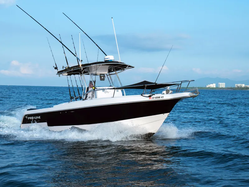 Center-console fishing boat speeding across the water